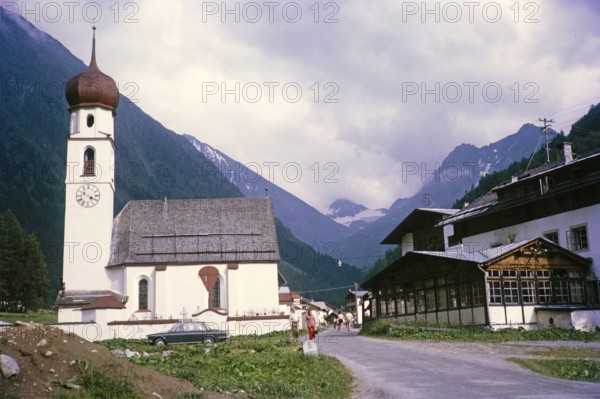 Historic village buildings and church of Maria Hilf, Gries im Sulztal, Ötztal Alps, Tyrol, Austria,