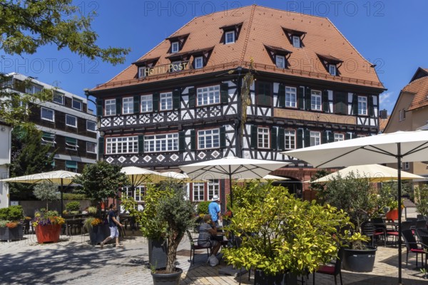 Town view of Nagold in the northern Black Forest. Half-timbered house Hotel Post on the suburban