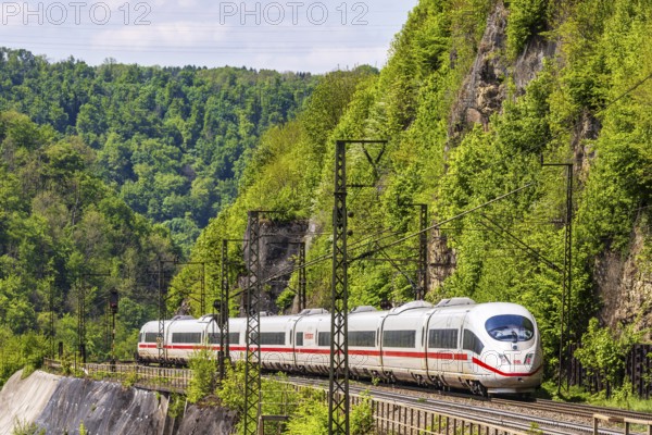 InterCityExpress ICE en route on the winding railway line of the Geislinger Steige. Landscape on