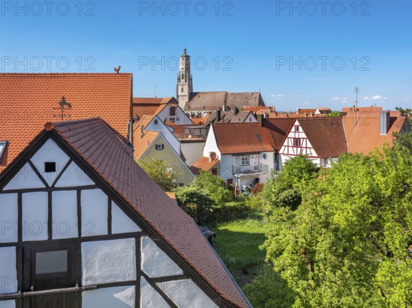 View from the medieval town wall over the houses of the historic old town to the tower of St