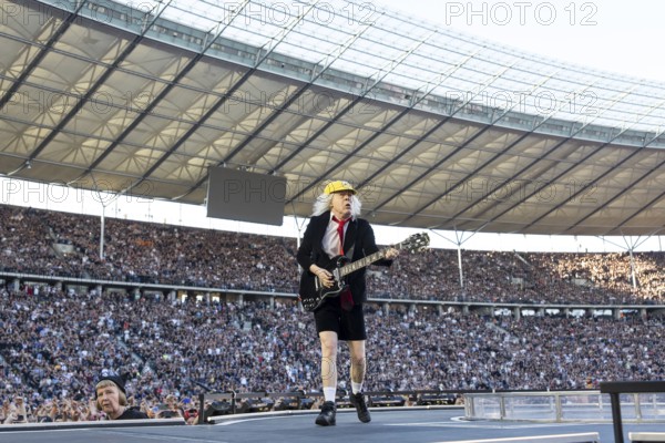 Angus Young, lead guitarist of AC/DC live on Power Up Tour 2025 at the Olympiastadion Berlin on 30