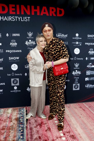 Barbara Schöne and Julian F. M. Stöckel at the VIP opening of the new Deinhard Salon Am Mühlanger