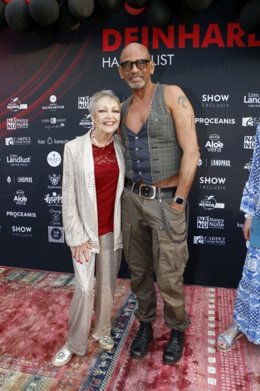 Barbara Schöne and Pierre Sanoussi-Bliss at the VIP opening of the new Deinhard Salon Am Mühlanger