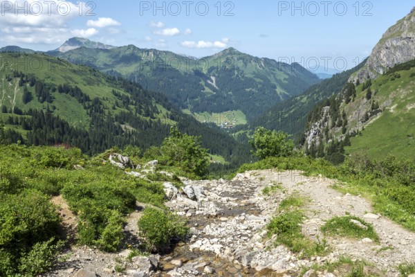 View from the hiking trail to the Hochalp Pass into Kleinwalsertal, behind Walmendinger Horn,