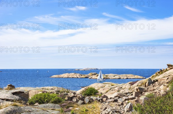 Archipelago with sailing boats off the coast of Lysekil, Bohuslän, Västra Götalands län, Sweden,