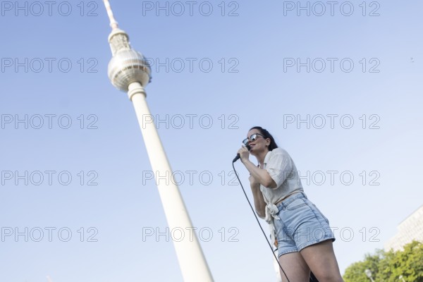 Singer Veronika Bognar on Alexanderplatz as part of the Fête de la Musique. The music event, which
