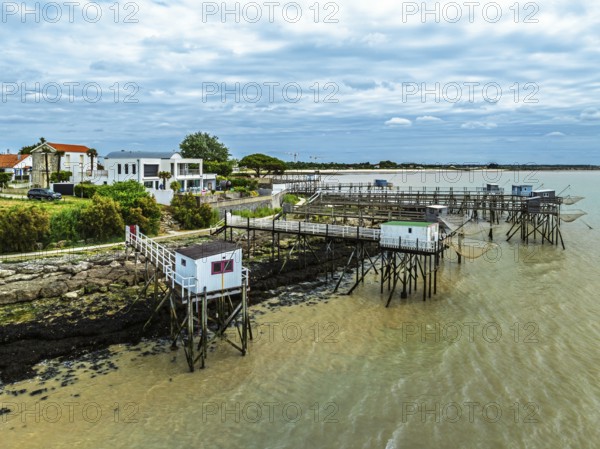 Fishing huts over Randonnee entre Histoire et Nature from a drone, Fouras, Fouras-les-Bains,