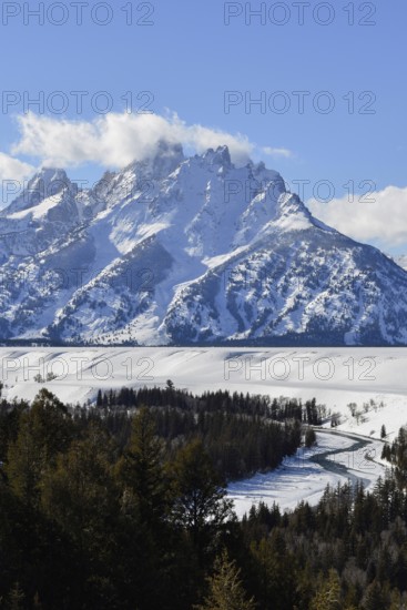 View over the Snake River... Teton Range (Rocky Mountains) in winter with snow, down in the valley
