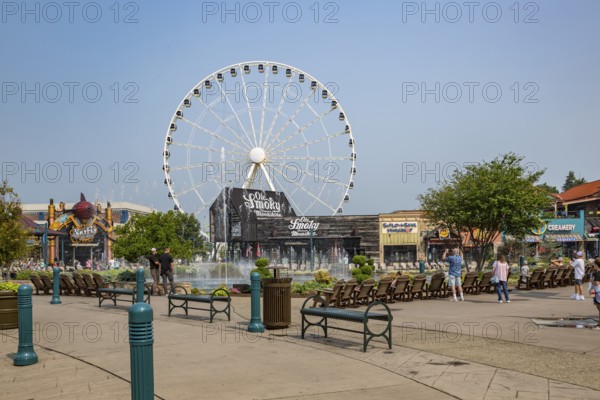 The Wheel ferris wheel behind the Ole Smoky Moonshine store at The Island recreation center in