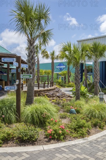 Sign directs guests to different attractions at Ocean Adventures Marine Park in Gulfport,