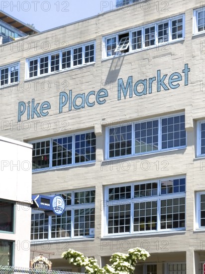 House wall with painted blue letters at Pike Place Market, Seattle, Washington, USA, North America