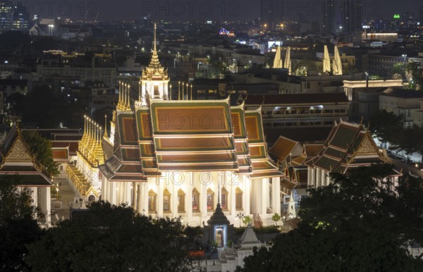 Panorama after sunset from Golden Mount to Wat Ratchanatdaram Worawihan and the Democracy Monument