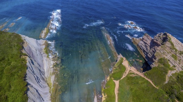 Breathtaking aerial view of the unique flysch rock formations along the coast of zumaia in the