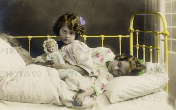 2 girls bed doll, 1920s, Two girls in a bed, one holding a doll, nostalgic and peaceful atmosphere,
