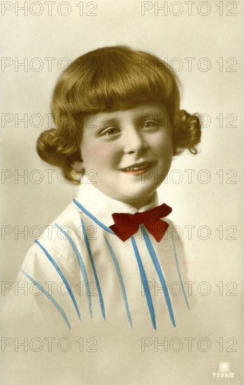 Portrait of a girl, 1920, girl in a striped shirt with a red bow, friendly and warm smile,