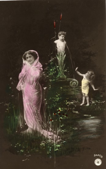 Woman and girl in front of a fountain, 1910s, Woman with pink veil and children in a flowery pond,