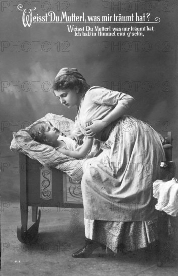 Mother with child, 1920s, A mother bends lovingly over her child in a beautiful cradle, Historical