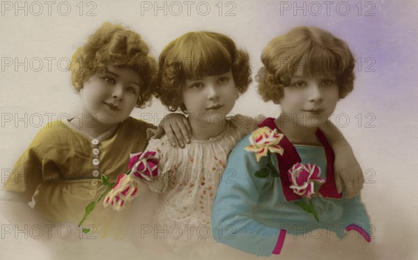 Three girls, 1920s, Three girls smiling in pastel-coloured, nostalgic shot, Historical photo