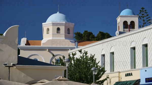 Mediterranean building with domes and steeple in vivid colours, Agia Paraskevi Church, Kos Town,