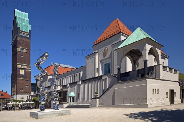 Wedding tower and exhibition building with stainless steel sculpture entitled Points of View by