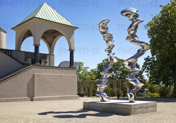 Stainless steel sculpture entitled Points of View by Tony Cragg in front of the exhibition
