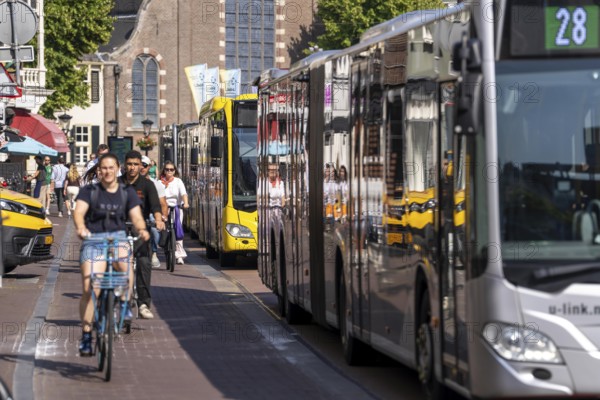 Central cycle path on the Lange Viestraat, lanes for pedestrians, cyclists and local traffic are