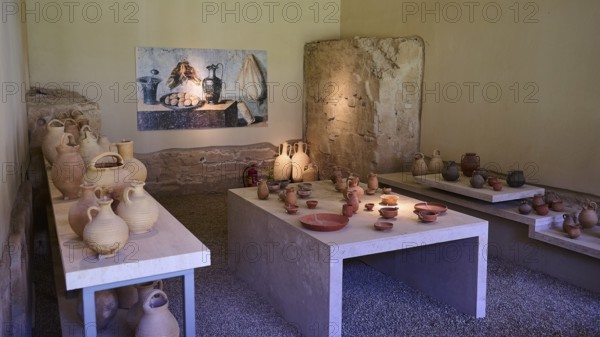 ©Udo Rein, Ancient ceramics exhibition in a museum with stone walls, storage objects, Casa Romana,