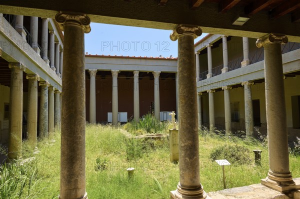 ©Udo Rein, Ancient courtyard with columns and an overgrown garden, Casa Romana, Kos Town, Kos,