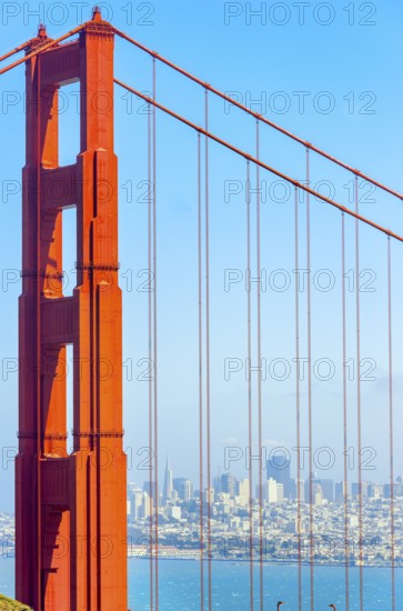 View of Golden Gate Bridge and financial district in the distance, San Francisco, California, USA