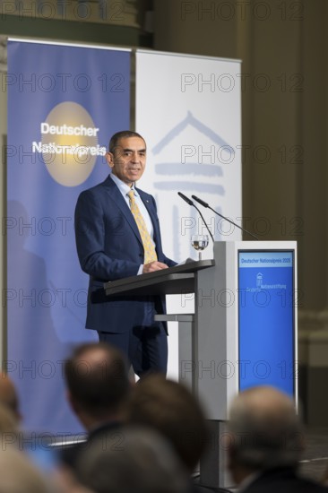 Ugur Sahin (founder of Biontech SE) gives an acceptance speech after receiving the German National
