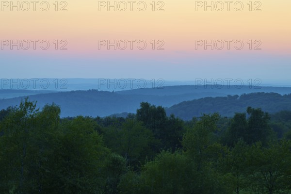 Blue dusk over hills and trees, quiet and peaceful atmosphere, Geishöhe, Dammbach, Spessart,