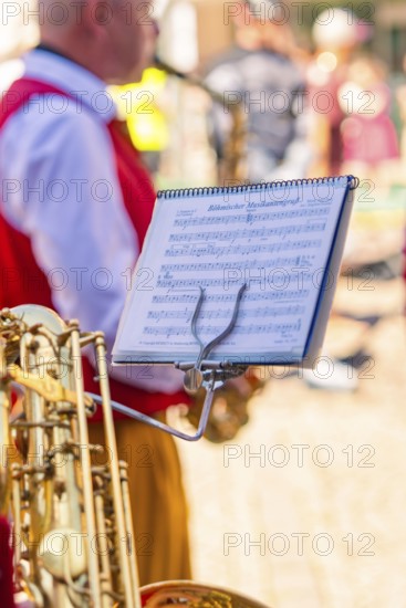 Close-up of a music stand during a concert performance, Calw railway station festival, Black