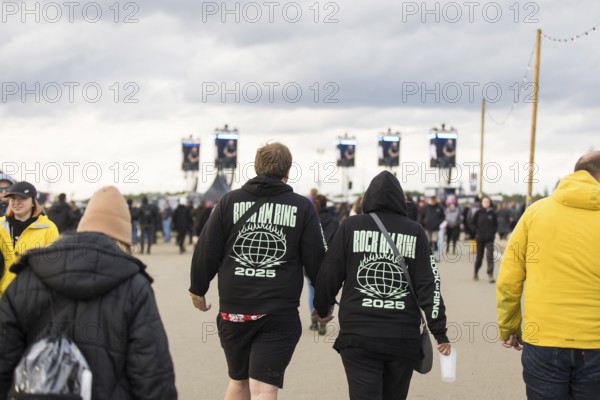 Festival visitor with Rock am Ring 2025 jumper at the Rock am Ring Festival on Sunday, Nürburgring