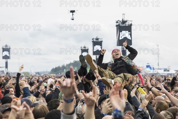 Festival visitor crowdsurfing at the Rock am Ring Festival on Friday, Nürburgring race track race