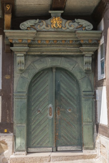 The Bürgersche Haus from 1639, entrance portal, with motto, coat of arms and ornamentation, Bad