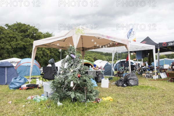 Pavilion with Christmas tree on a campsite at the Rock am Ring Festival on Saturday, Nürburgring
