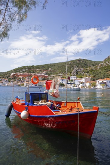 Red boat in the harbour of Agia Kiriaki on the Aegean Sea, Pelion or Pelion Peninsula, Magnisia,