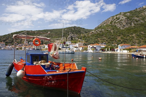 Red boat in the harbour of Agia Kiriaki on the Aegean Sea, Pelion or Pelion Peninsula, Magnisia,