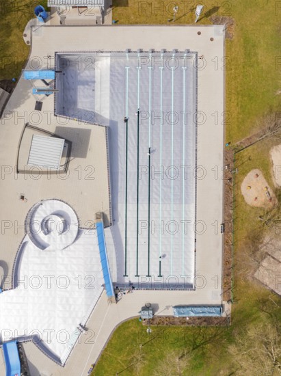 Aerial view of the swimming area with large lawn and surrounding green park, renewal of the