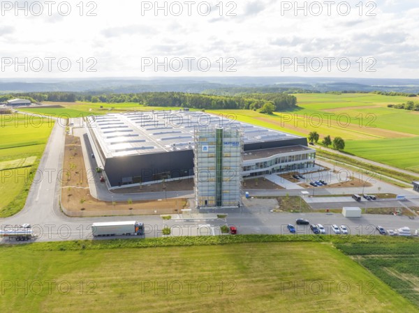 Spacious landscape with a large industrial building and fields, ING Park development area,
