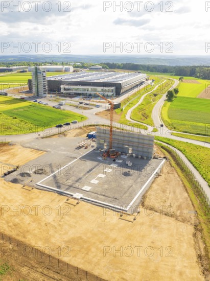 Aerial view of a construction site in the middle of a rural landscape with fields, ING Park