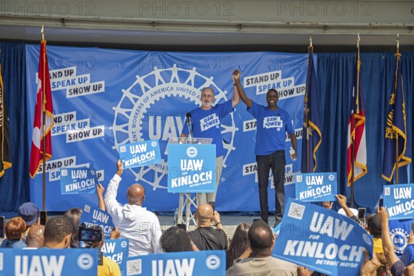 Detroit, Michigan USA - 7 June 2025 - United Auto Workers President Shawn Fain (left) joins Rev.