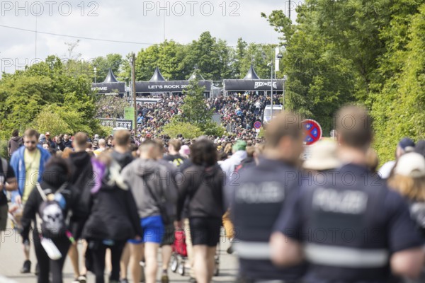 Festival visitors on their way to the main entrance at the Rock am Ring Festival on Friday,