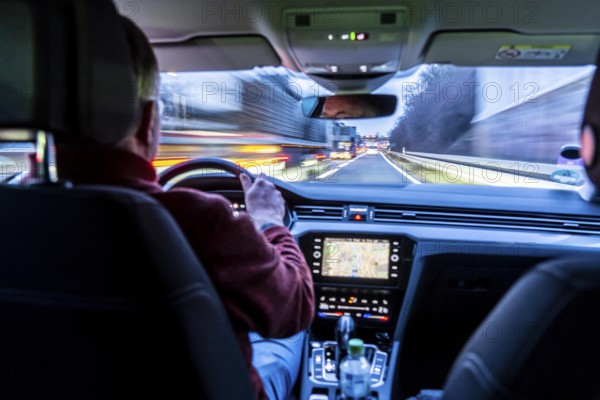 Driving on the A40 motorway, motorway access, Ruhrschnellweg, in heavy traffic, driver's