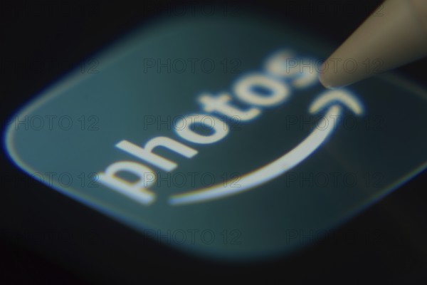 Dhaka, Bangladesh- 06 Dec 2025: Close-up of the Amazon Photos app on a screen with a stylus