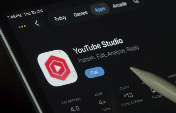 Dhaka, Bangladesh- 30 Oct 2025: Youtube Studio app displayed on a iPad screen in dark mode with a