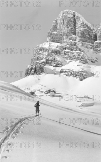 Ski hike in winter in front of the Nuvolao Alto (2648 m) snow, Alps, mountaineer, skier, around