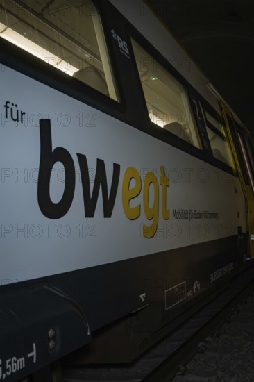Close-up of a train with 'bwegt' inscription in a tunnel, fire department exercise on the Hermann