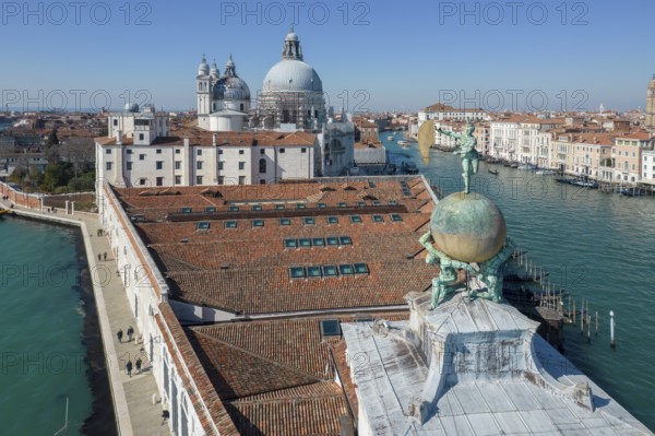 Drone footage of the Dogana da Mar, moving wind vane of Saint Fortuna on a gilded globe carried by