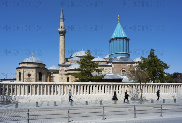 Grand mosque with minaret and religious architecture under clear skies, Mevlana Museum, Mevlana,